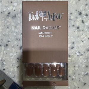 Red Aspen latte glue on Nails